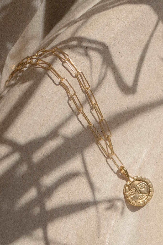 We.ar the sun necklace